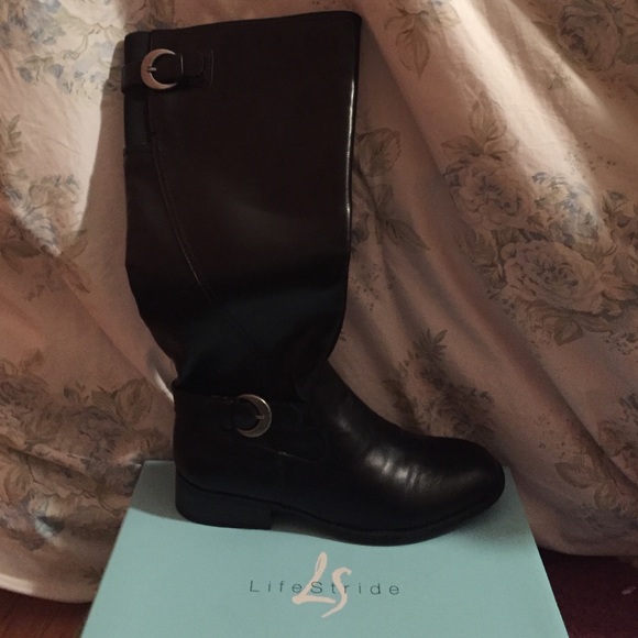 Black mid-calf boots with two silver buckles