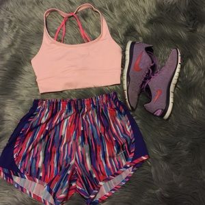 Light pink and hot pink sports bra