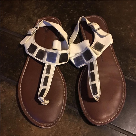 Cream sandals with silver plated detailing