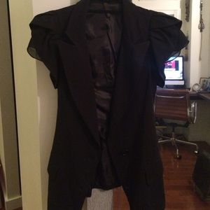 Very chic and flattering black silk blazer