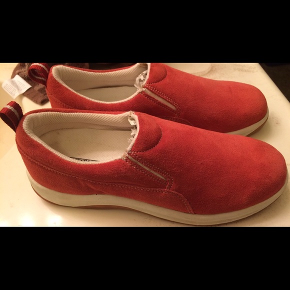 Coral slip on shoes.
