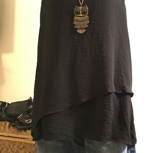 a.n.a large, black, flowy tank.