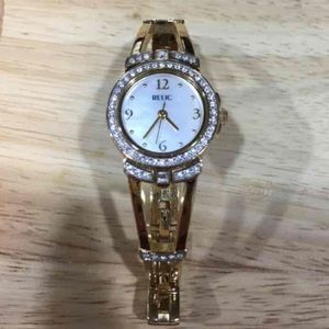 Gold women's Relic watch