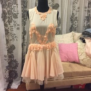 UNIF light pink dress with flower appliqué. Size M