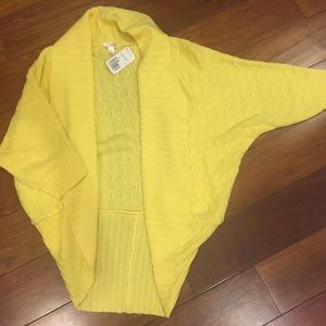 yellow sweater