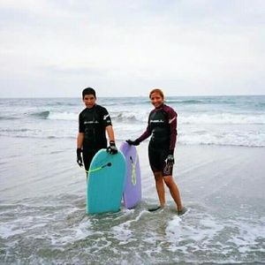 His & hers wetsuits