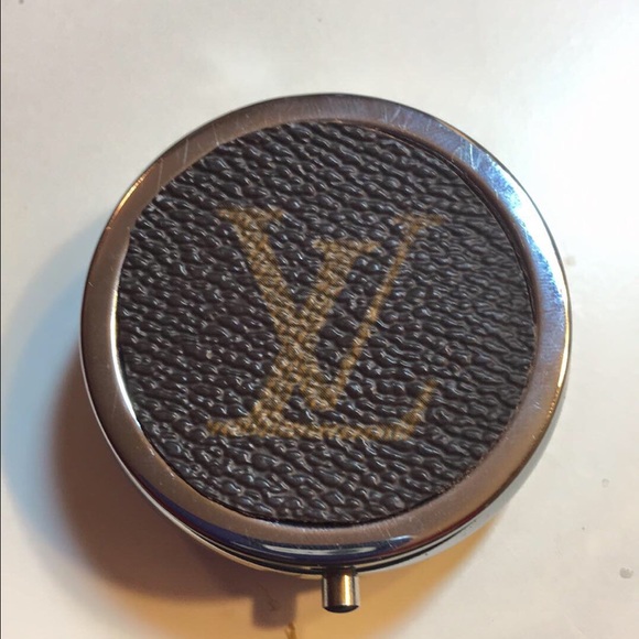 Pill case in-layed with authentic LV canvas.