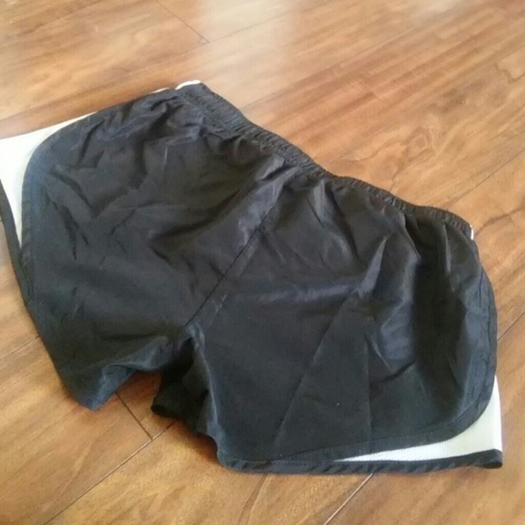 Both pairs of shorts for 12. Otherwise each for 9 - Picture 3 of 3