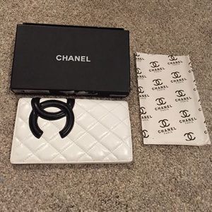 White wallet with pink interior