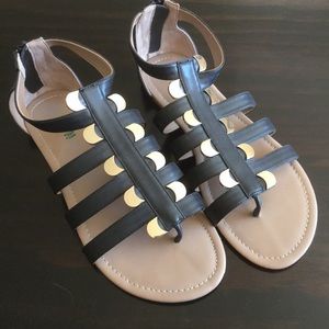Black and gold gladiator sandals