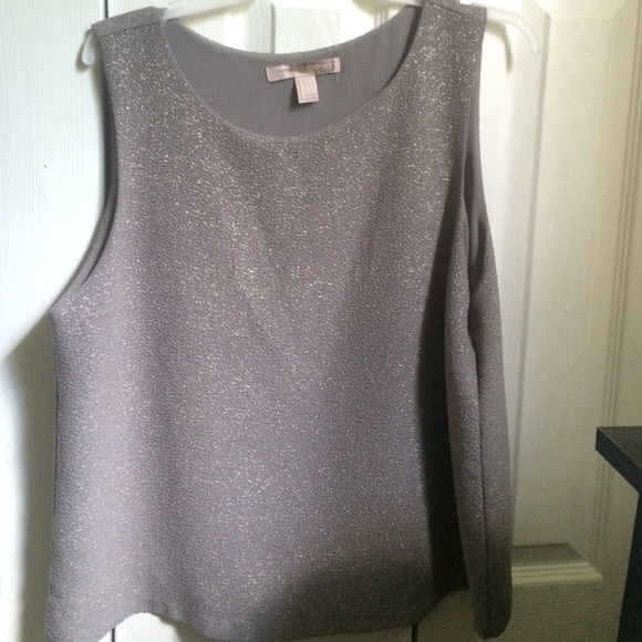 A grey and gold shirt