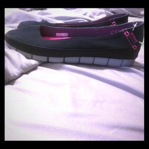 Croc flats size 10 with tags.