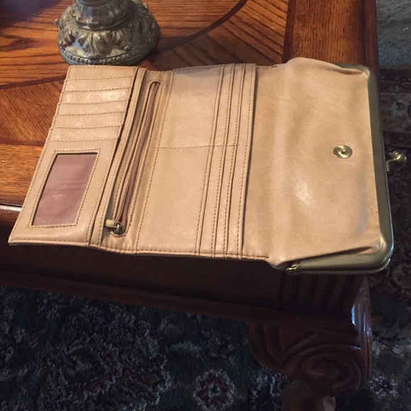 Hobo wallet that folds 3 way.