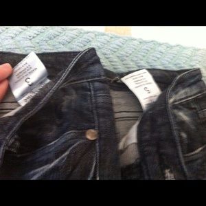 Machine jeans with denim wash on front.