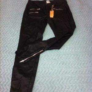Leather pants, zipper detail on front and side.