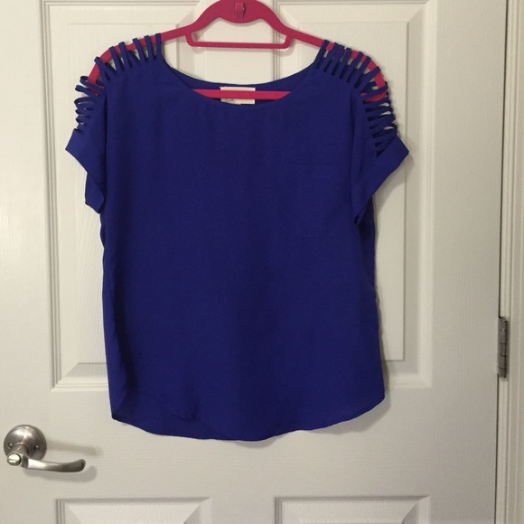 Royal blue top with slashed shoulders