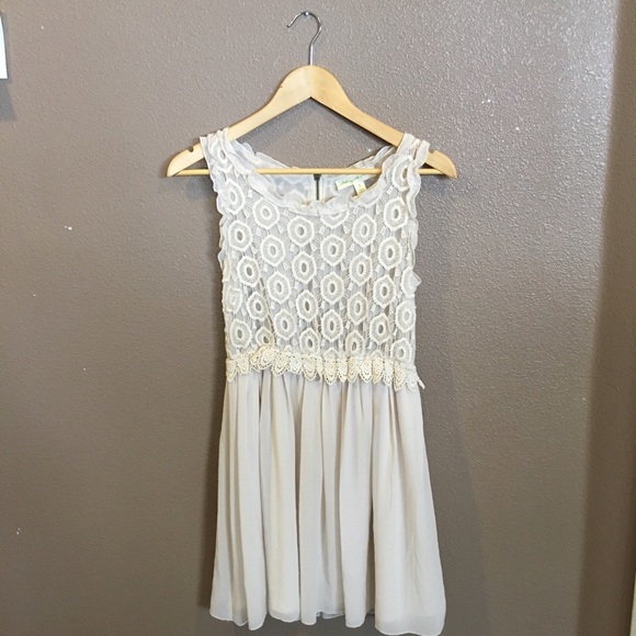 Cute cream flowy dress.