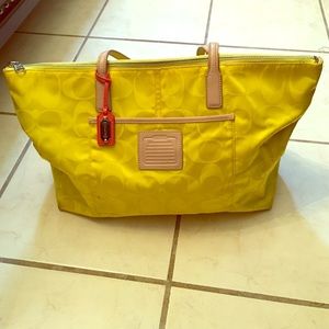 A colorful COACH bag