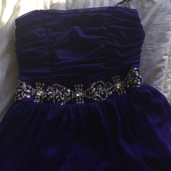 This is a deep purple strapless high-low dress - Picture 2 of 2