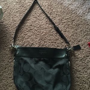 Coach cross body or shoulder bag.