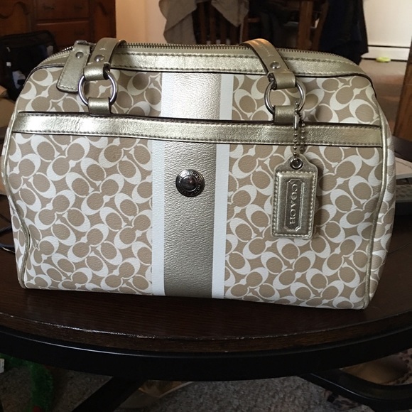 Gold coach bag