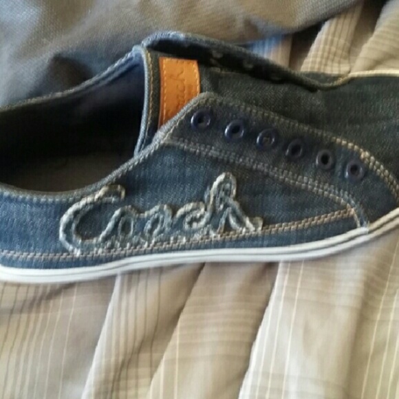 Pair of coach sneakers