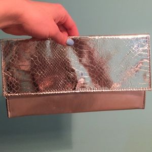 Saks silver clutch