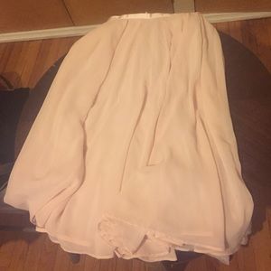 Pale pink knee length skirt