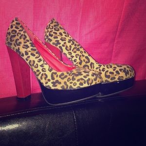 Size 7.5 Cheetah Print Heels in great condition!