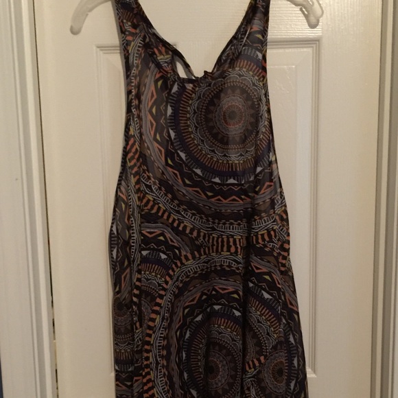 Long sheer handkerchief hem top with tie back