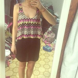 Black dress with flowy printed top part.