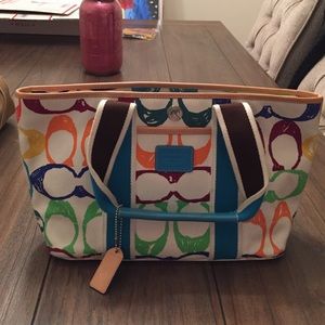 White coach material bag