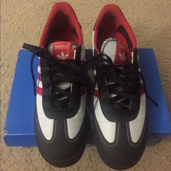 Red grey and black Adidas Dragon