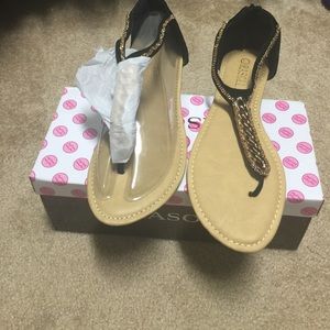 Black sandals with rose gold
