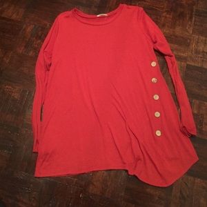 Long sleeve shirt with buttons down the side
