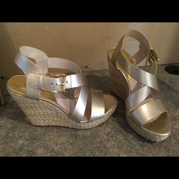 MK gold wedge sandals