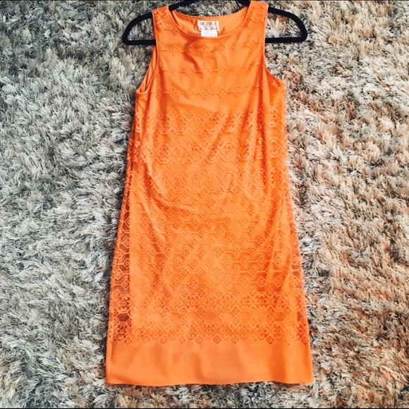 Stunning orange dress with patterned overlay!