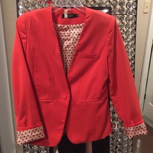 Coral/Orange Blazer with Polka Dot lining.