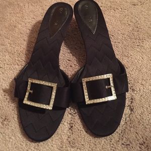 Black satin Unisa shoes with a diamond buckles.