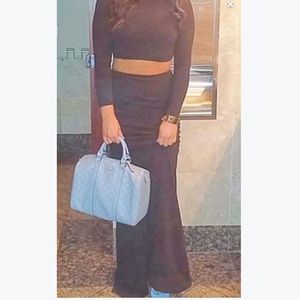 2 pices long black skirt an crop shirt