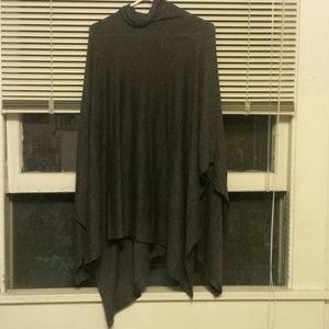 A grey Turtleneck Sweater