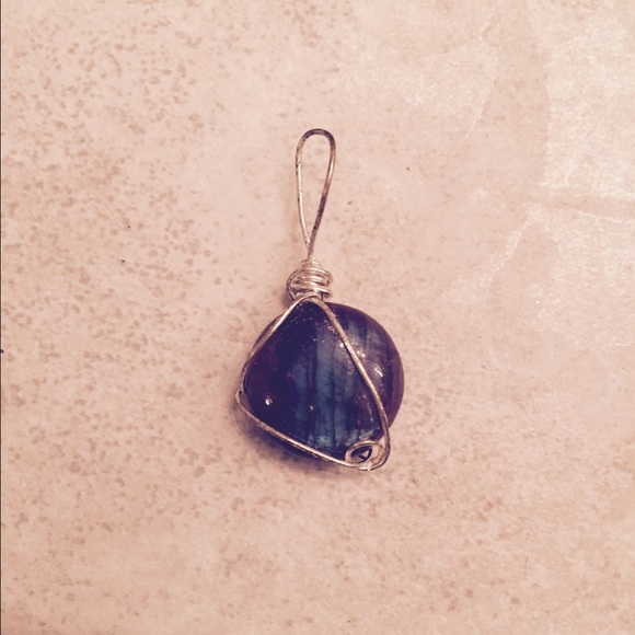 Women's purple pendant very ornate