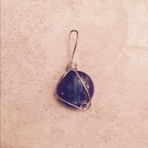 Women's purple pendant very ornate