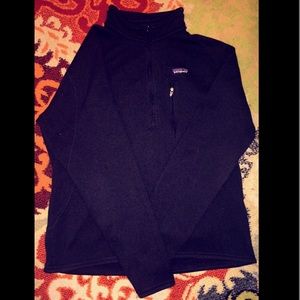 All black Patagonia 1/2 zip fleece pullover