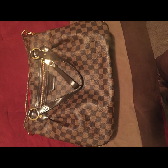 Louis Louis Vuitton hand bag 🔝💯👌🏾NWOT