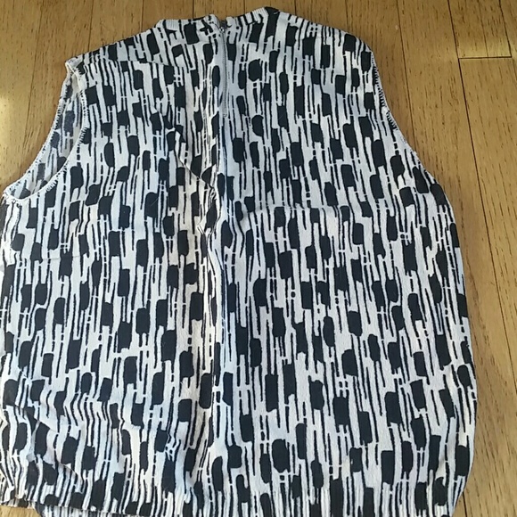 *1950s sleeveless sweater with zip.
