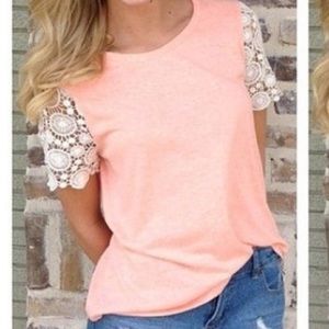 Pink shirt with lace sleeves