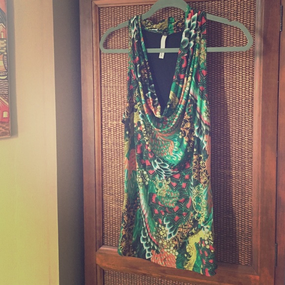 Vibrantly colored sleeveless, scoop neck top