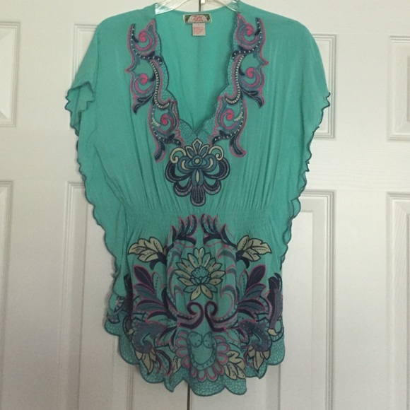 Blue top with embroidered design