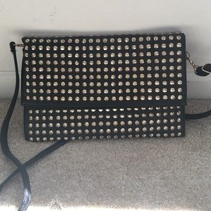 Studded cross body.
